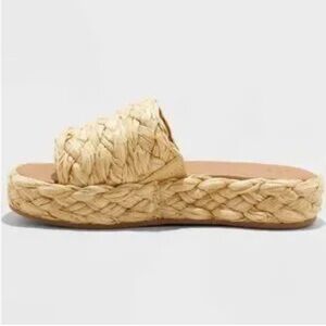 Woven raffia flat form slide sandal